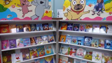 Library shelves with books