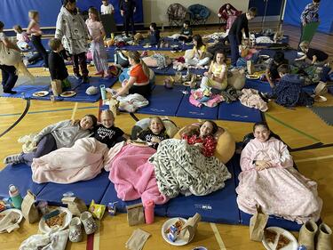 Students Watching Movie in Gym