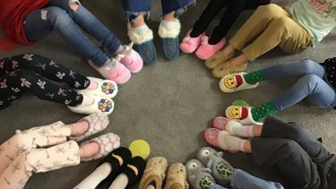 Students with Mocs and Slippers