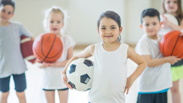 Elementary Students with Balls