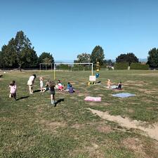 Students enjoying a picnic on the field