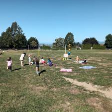 Students enjoying a picnic on the field