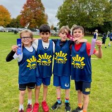 Boys Cross Country Team with Ribbons