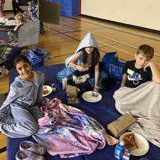 Students on Mats for Movie Night