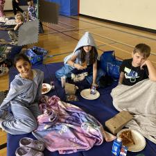 Students on Mats for Movie Night