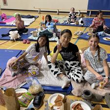 Students on Mats for Movie Night