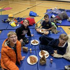 Students on Mats for Movie Night