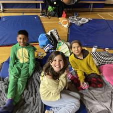 Students on Mats for Movie Night