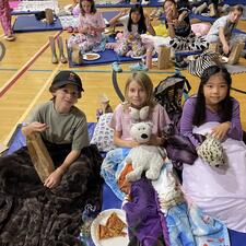 Students on Mats for Movie Night