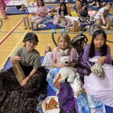 Students on Mats for Movie Night