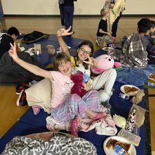 Students on Mats for Movie Night