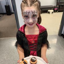 Student with Halloween Treats