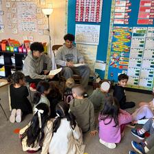 Yale Black Excellence Students reading to Elementary Students