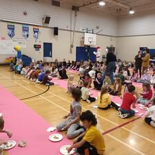 Students Enjoying Pancakes in the Gym