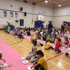 Students Enjoying Pancakes in the Gym