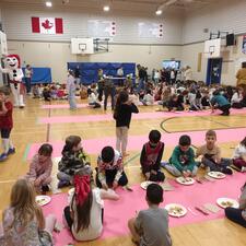 Students Enjoying Pancakes in the Gym