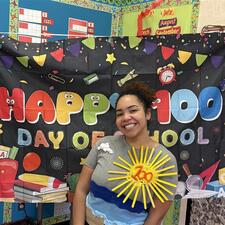 Volunteer with 100 Day Decoration