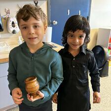 Students Displaying Cultural Item