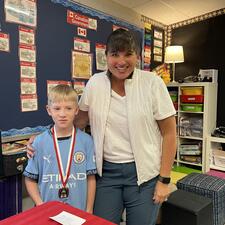 Student with Public Speaking Medal