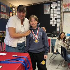 Student with Public Speaking Medal