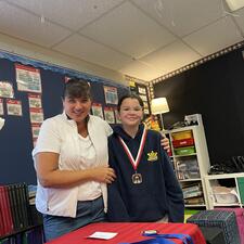 Student with Public Speaking Medal