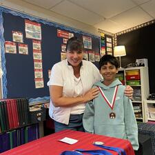 Student with Public Speaking Medal